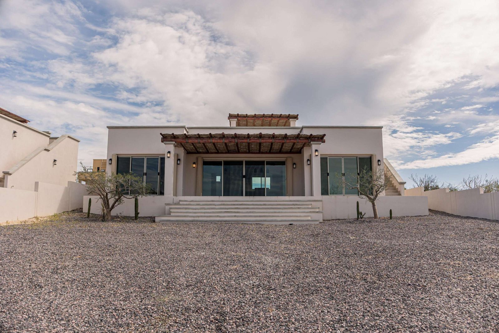 Todos Santos Todos Santos Nth-Gen A contemporary two-bedroom, two-and-a-half-bathroom residence located at the end of Calle Telmex in La Ahorcadita, Todos Santos. Designed with a comfortable single-level layout, the home features an open kitchen, generous living spaces, and a seamless indoor-outdoor flow suited for relaxed coastal living. Set on a quarter-acre lot, the property captures panoramic – Lote 014 Manazana 145, Pacific, BS