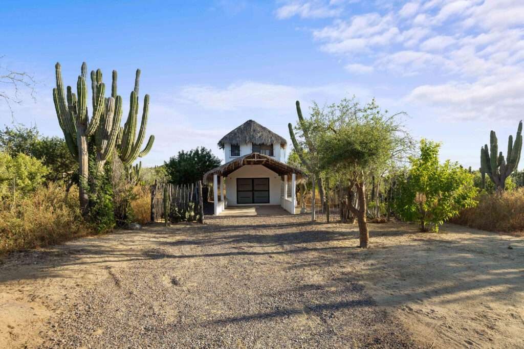Todos Santos Pescadero Escape to your own slice of paradise with this exceptional 1.35-acre property nestled in the charming coastal community of Pescadero, Baja California Sur. This parcel offers endless possibilities for creating your dream retreat, complete with a two-story casita and storage bodega already in place to get you started.The generous lot size provides ample space for expansion, gardens, or simply enjoying the tranquil desert landscape that defines this magical region. Your future home will be perfectly positioned between the beloved surf spots of San Pedrito and Cerritos, offering easy access to some of Baja's most pristine beaches. A leisurely ten-minute stroll down a peaceful dirt road leads directly to the ocean, where you can catch waves, watch spectacular sunsets, or simply unwind to the sound of crashing surf.The location strikes an ideal balance between seclusion and convenience, sitting close to the acclaimed Hierbabuena restaurant and the prestigious Grove luxury housing development. This prime positioning places you within reach of Todos Santos'vibrant arts scene and Cabo San Lucas'world-class amenities, while maintaining the peaceful, authentic Baja lifestyle that draws visitors from around the globe.The existing casita provides immediate shelter and potential for renovation, while the storage bodega offers practical space for equipment, supplies, or workshop activities. The outdoor space is truly limitless, perfect for hosting gatherings, cultivating gardens, or creating recreational areas that take advantage of the – Pescadero 1+ Acre with Casita, Pacific, Pacific, BS