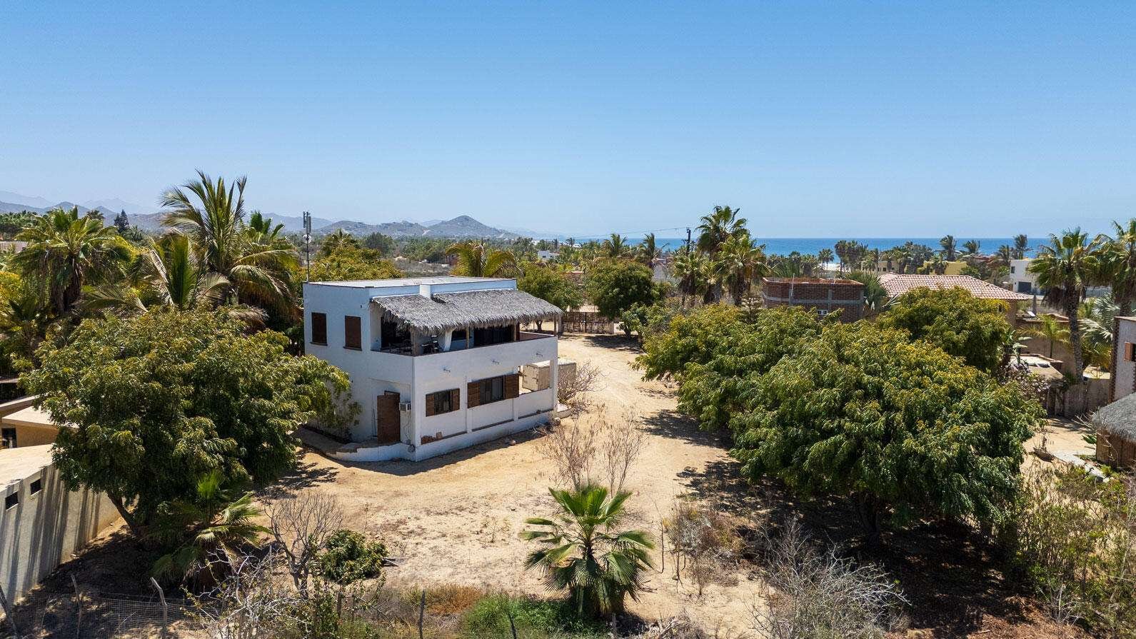 Todos Santos Pescadero Stunning Beachside Living at San PedritoLive just steps from the beach and the renowned San Pedrito Surf Break in one of the most desirable areas of town. This charming home offers the perfect blend of convenience and potential, with ample space to expand and make it your own. Boasting 2-3 bedrooms and 2 bathrooms, this property features a spacious porch perfect for enjoying the ocean breeze, a large garage, and lush, mature landscaping. Situated on a generous ½ acre of land, there's plenty of room for future growth or outdoor activities.Whether you're a surf enthusiast, nature lover, or simply seeking a serene coastal lifestyle, this home offers the ideal opportunity to live in one of the most coveted neighborhoods. Don't miss your chance to own a piece of paradise! – San Pedrito Surf Villa, Pacific, Pacific, BS
