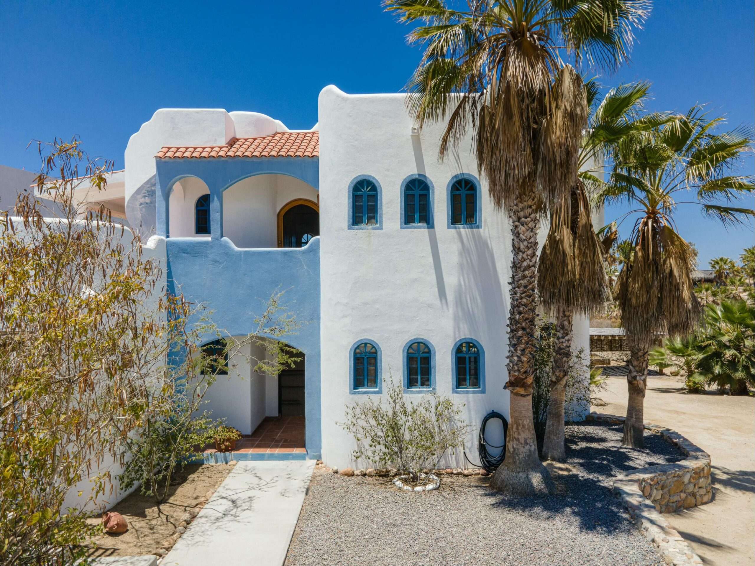 Todos Santos Las Tunas Tucked into one of the most sought-after neighborhoods of Todos Santos, this distinctive property in Las Tunas offers a lifestyle defined far more by space, sky, and ocean air than by interior square footage. The home features two bedrooms and two baths, yet it lives expansively thanks to the thoughtfully designed outdoor living areas--spaces that truly capture what coastal Baja living is all about.The patios function as an extension of the home, creating multiple zones for gathering, relaxing, and entertaining. Upstairs, a generous sectional invites long evenings warmed by a fire pit. Enjoy ocean and mountain for sale
