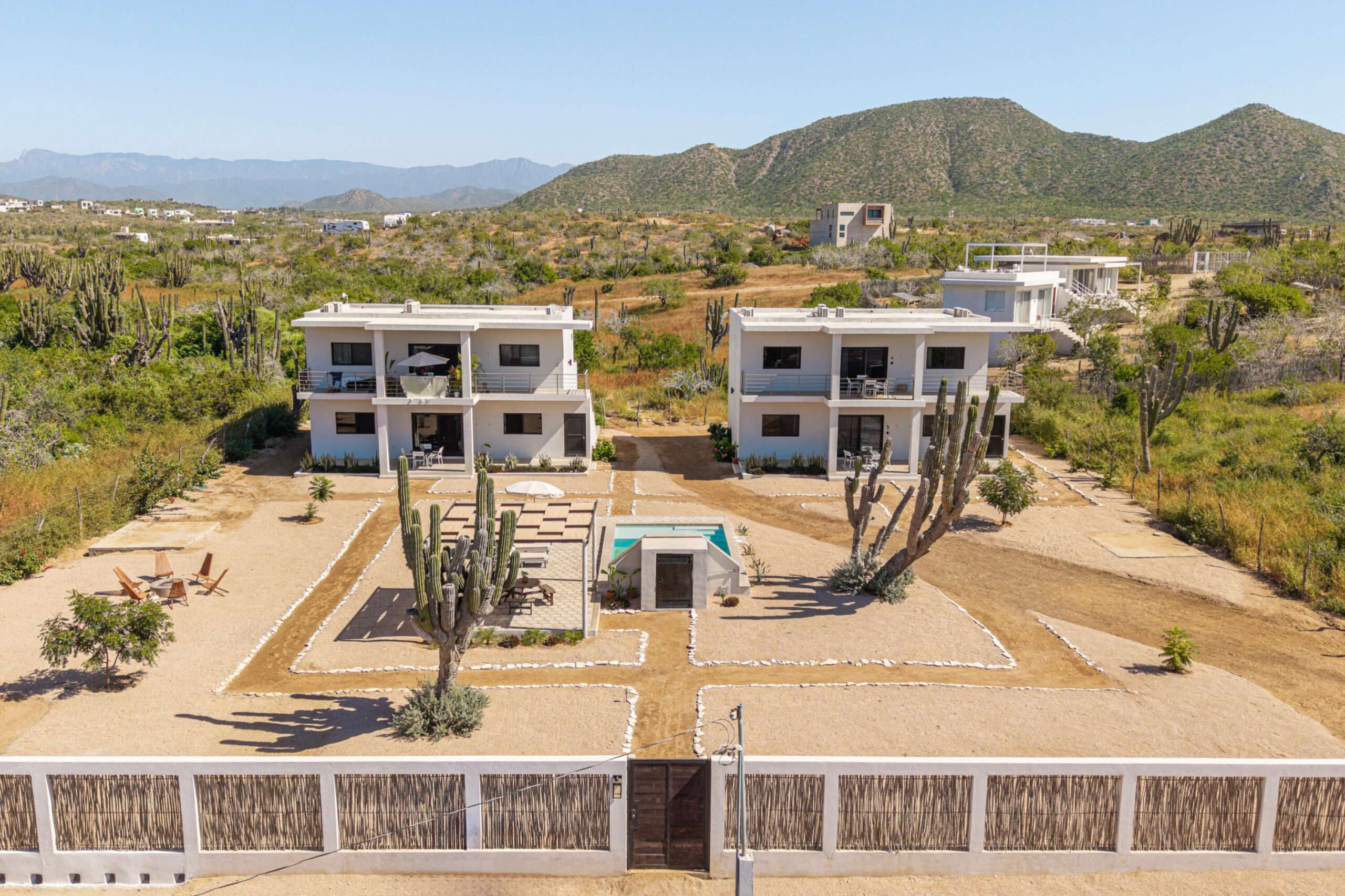 Todos Santos Cerritos Step into a done-for-you investment and lifestyle opportunity with this brand new, fully furnished fourplex featuring four stylish 2-bedroom, 2-bathroom apartments across two modern buildings. Designed for effortless ownership and high rental appeal, each unit offers a spacious open-concept layout, a fully equipped kitchen, and a private outdoor patio perfect for relaxing after a day in the sun. Set on a generous 2,000m² gated lot, the property includes ample parking, a sparkling pool, and a shaded pergola lounge area that captures the laid-back Baja vibe. Each apartment has its own Wi-Fi and CFE meter, ensuring easy management for both long- and short-term rentals. Just a short stroll from the Cerritos Beach surf break, popular restaurants, and boutique shops, this property is ideally located to attract visitors seeking the best of Baja's surf, sun, and serenity. With room to expand and increase revenue, it is not only a profitable investment but also your chance to enjoy a relaxed coastal lifestyle.Own a turnkey slice of paradise, live in one, rent the rest, and let the Baja lifestyle pay for itself. for sale