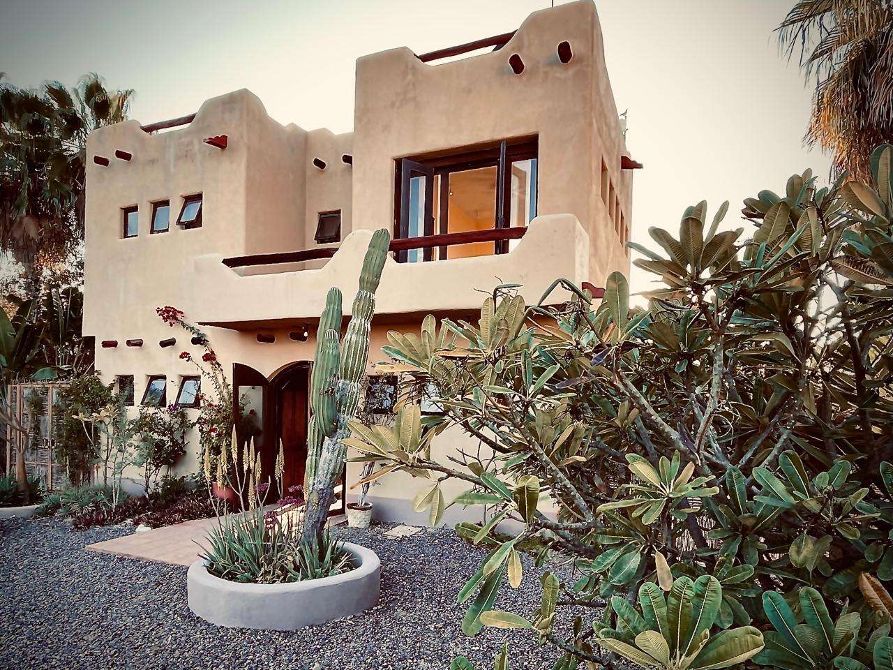 Todos Santos Las Playitas Perched above the Pacific coastline, this elegant two-story California Colonial residence captures spectacular sunset for sale