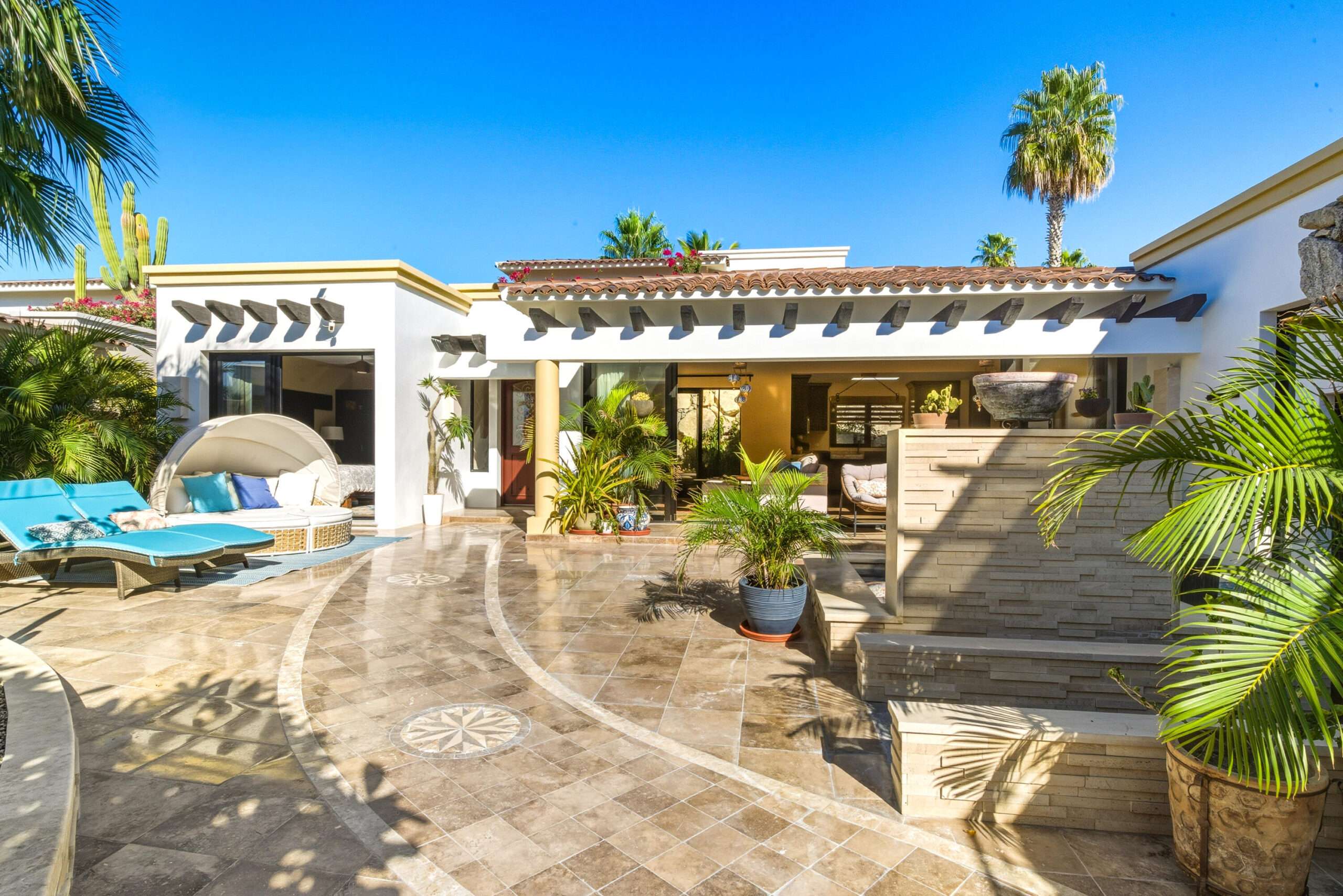Todos Santos Cerritos Rare opportunity just minutes from Cerritos Beach! This charming Hacienda-style home sits in a fully walled compound with two vehicle gates, side access, and a garage, with ample room to expand. Enjoy a solar-heated pool, hot tub, expansive patios, and gorgeous mature landscaping that creates a private oasis. Incredible ocean and mountain for sale