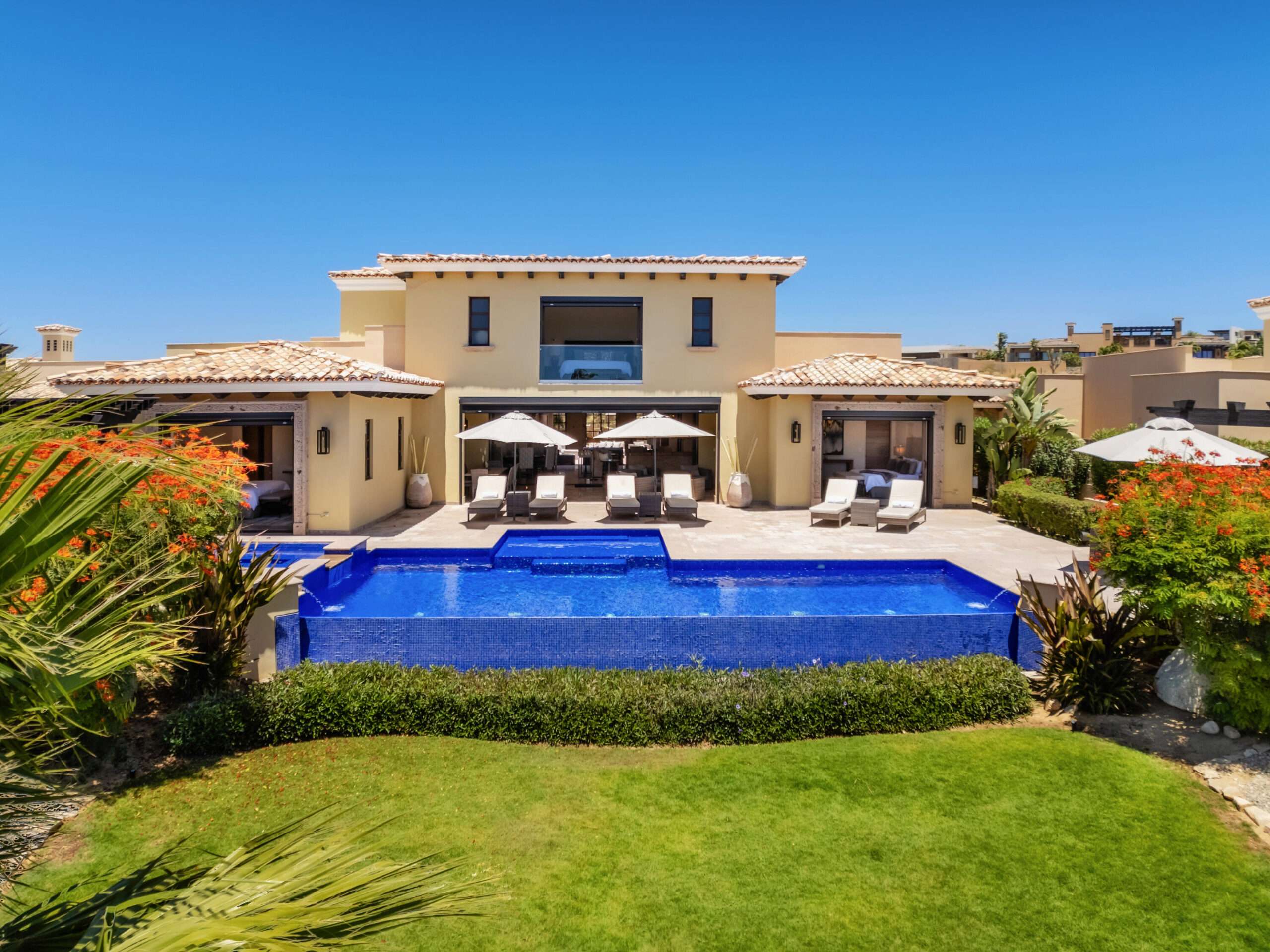 Todos Santos Las Playitas Perched above the Pacific coastline, this elegant two-story California Colonial residence captures spectacular sunset for sale
