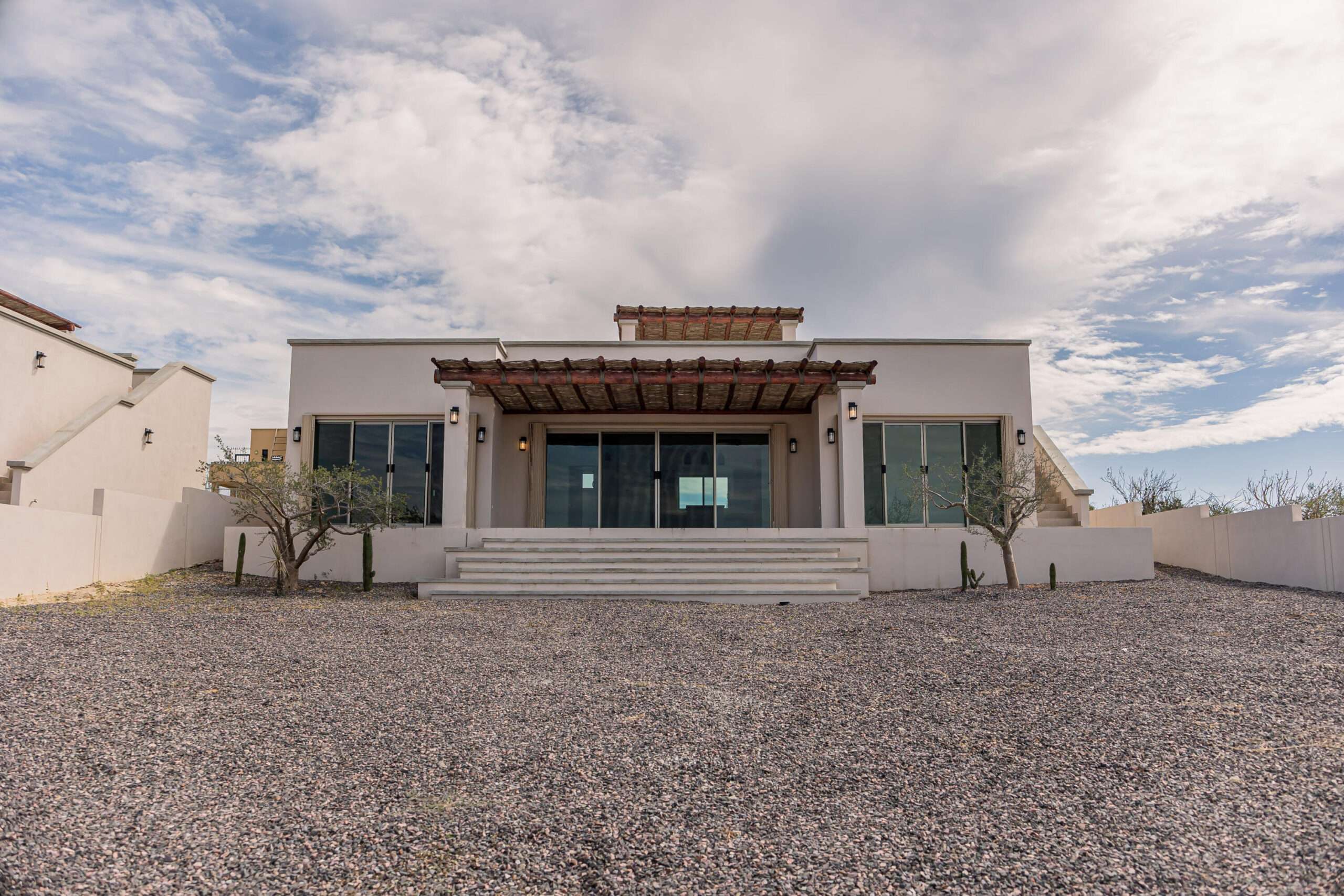 Todos Santos Todos Santos Nth-Gen A contemporary two-bedroom, two-and-a-half-bathroom residence located at the end of Calle Telmex in La Ahorcadita, Todos Santos. Designed with a comfortable single-level layout, the home features an open kitchen, generous living spaces, and a seamless indoor-outdoor flow suited for relaxed coastal living. Set on a quarter-acre lot, the property captures panoramic for sale