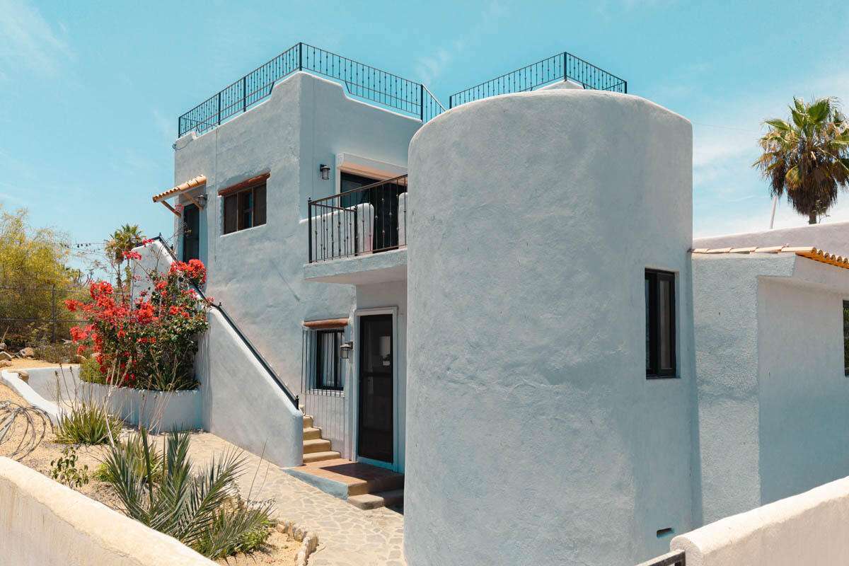 Todos Santos San Sebastian Discover the charm and elegance of the San Sebastian Tropical Suites, a stylish residence featuring four tastefully appointed Tropical Suites. This exceptional property offers a perfect blend of comfort and sophistication, making it an ideal choice for those seeking a distinctive home away from the ordinary cookie-cutter designs. The main home with a generous 1-bedroom, 1.5-bathroom layout that includes a grand great room, designed with graceful arches and clean lines, seamlessly connecting the living space to an open kitchen. Originally designed by the late Ezio of the renowned Cafe Santa Fe, this residence embodies Todos Santos living with thoughtful attention to detail. The second-story Tropical Suite offers separate entrances, full bath, and access to a rooftop deck with breathtaking tropical vistas. Designed for José (the caretaker), the Casita includes a full bath and kitchenette, offering total independence and convenience. Together, the property features three or four independent rental units, making it a lucrative investment opportunity. Situated conveniently between Todos Santos' vibrant downtown and the serene beaches of San Sebastian, this property not only offers tranquility but also easy access to local attractions and amenities. You'll appreciate the charm of this unique home that reflects character and style, for those looking to embrace coastal living in a captivating environment. Experience the allure of San Sebastian Tropical Suites for yourself--schedule a visit to explore all that this remarkable property has to offer!Descubra el encanto y la elegancia de San Sebastián Tropical Suites, una residencia con estilo que cuenta con cuatro suites tropicales decoradas con gusto. Esta excepcional propiedad ofrece una combinación perfecta de confort y sofisticación, lo que la convierte en la opción ideal para quienes buscan un hogar distintivo, alejado de los diseños convencionales. La casa principal cuenta con una amplia distribución de 1 dormitorio y 1,5 baños, que incluye una gran sala de estar, diseñada con elegantes arcos y líneas limpias, que conecta a la perfección el espacio habitable con una cocina abierta. Diseñada originalmente por el difunto Ezio del renombrado Café Santa Fe, esta residencia encarna el estilo de vida de Todos Santos con una cuidada atención al detalle. La suite tropical del segundo piso ofrece entradas independientes, baño completo y acceso a una terraza en la azotea, perfecta para disfrutar de impresionantes vistas y relajarse al aire libre. Sobre el garaje para dos autos con bodega, el espacioso estudio tipo loft funciona como una versátil sala de estar con cocina tipo galera. Esta área también ofrece acceso a una terraza en la azotea con impresionantes vistas tropicales. Diseñada como unidad para José el cuidador, la Casita incluye un baño completo y una cocineta, ofreciendo total independencia y comodidad. En conjunto, la propiedad cuenta con cuatro unidades de alquiler... for sale