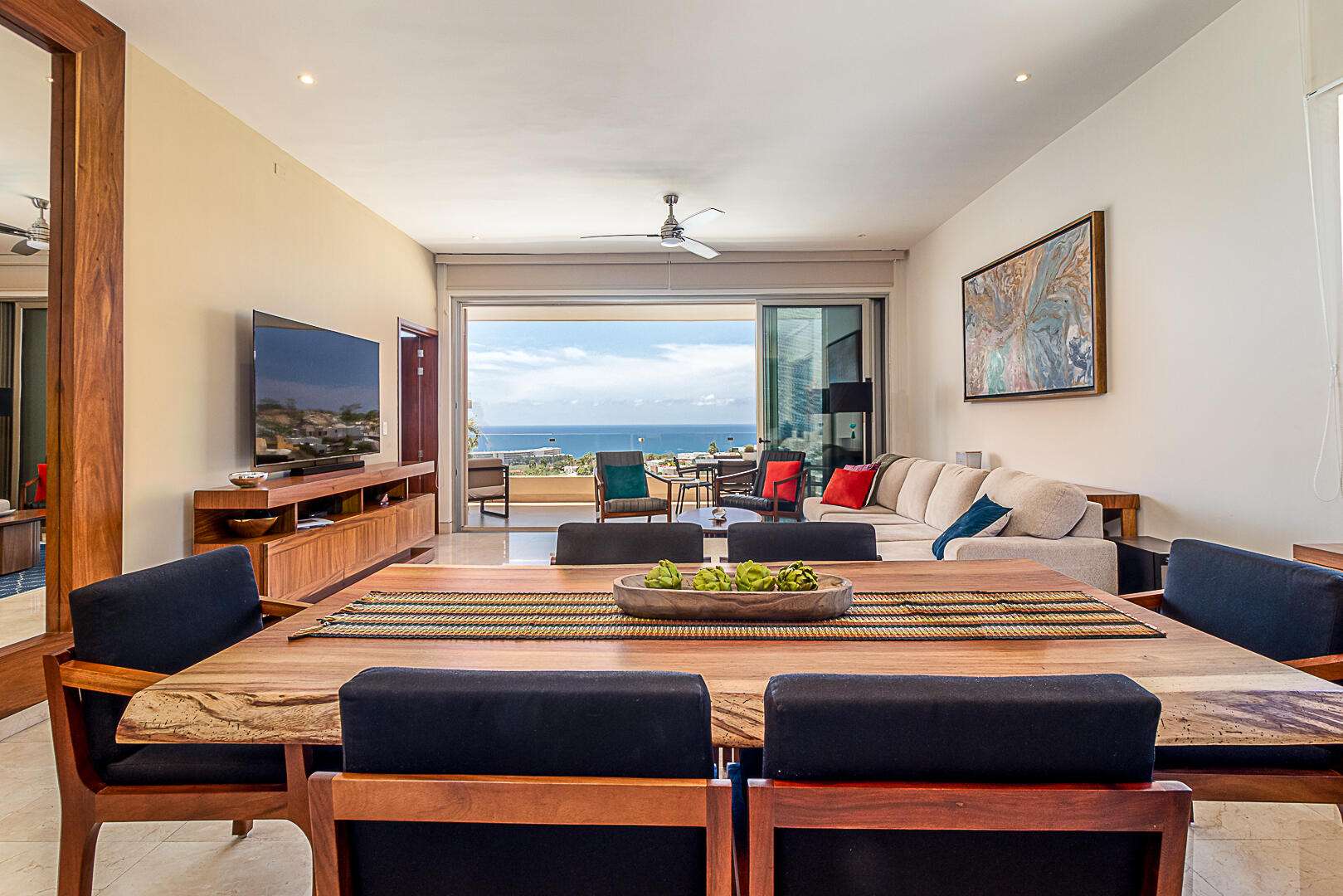 Todos Santos Villas De Cerritos Beach This charming two-story home blends comfort, modern style, and laid-back Baja beach living. From the moment you arrive, the well-kept landscaping and contemporary coastal architecture set the tone for a serene and welcoming atmosphere.Inside, an open-concept layout connects the living room, dining area, and kitchen, naturally lit by large windows that frame glimpses of the surrounding landscape. The neutral color palette and relaxed furnishings create an immediate sense of calm. The kitchen is modern and functional, featuring stainless steel appliances, ample counter space, and smart storage. A half bath on this level adds convenience for guests. Sliding pocket doors open onto a private patio with a pergola perfect for outdoor dining, sun lounging, and enjoying Baja's breezy afternoons. The garden area has been thoughtfully designed for intimate gatherings and immersing in nature.Upstairs, two of the three bedrooms offer peaceful sanctuaries. The primary bedroom includes an en-suite bathroom, while the other two share a modern full bath.But the real highlight awaits on the third-level roof deck a luxurious jacuzzi overlooking panoramic for sale
