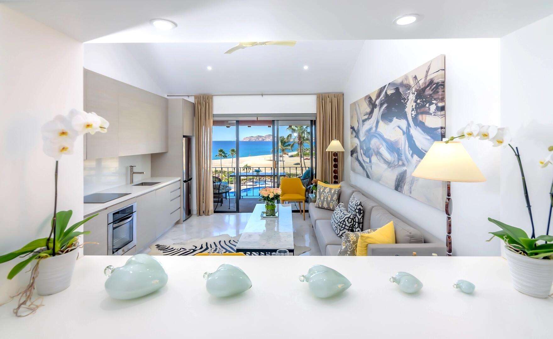 Todos Santos Villas De Cerritos Beach This charming two-story home blends comfort, modern style, and laid-back Baja beach living. From the moment you arrive, the well-kept landscaping and contemporary coastal architecture set the tone for a serene and welcoming atmosphere.Inside, an open-concept layout connects the living room, dining area, and kitchen, naturally lit by large windows that frame glimpses of the surrounding landscape. The neutral color palette and relaxed furnishings create an immediate sense of calm. The kitchen is modern and functional, featuring stainless steel appliances, ample counter space, and smart storage. A half bath on this level adds convenience for guests. Sliding pocket doors open onto a private patio with a pergola perfect for outdoor dining, sun lounging, and enjoying Baja's breezy afternoons. The garden area has been thoughtfully designed for intimate gatherings and immersing in nature.Upstairs, two of the three bedrooms offer peaceful sanctuaries. The primary bedroom includes an en-suite bathroom, while the other two share a modern full bath.But the real highlight awaits on the third-level roof deck a luxurious jacuzzi overlooking panoramic for sale