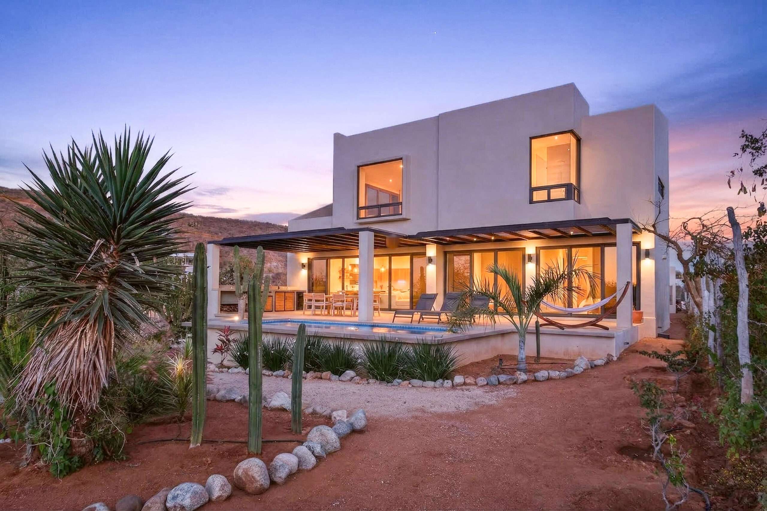 Todos Santos Pescadero Sunsets over the Pacific, basil fields at your doorstep, and the quiet luxury of Pescadero living -- welcome to Villa Pacifica. Tucked into one of the area's most desirable neighborhoods, this beautifully designed home offers privacy, open skies, and close proximity to Cerritos Beach and the surf breaks of San Pedrito. Created for effortless indoor-outdoor living, the property features a sparkling pool, outdoor kitchen, and shaded dining area ideal for entertaining. The rooftop terrace captures stunning Pacific sunset for sale