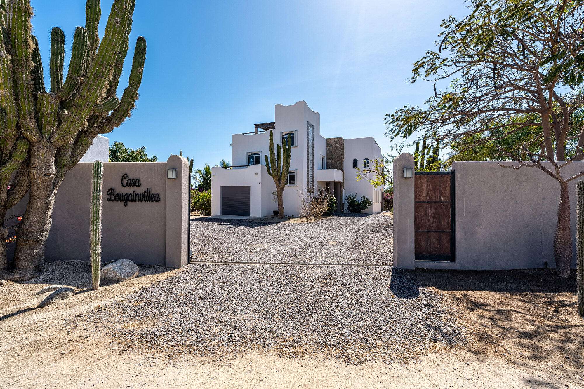 Todos Santos Pescadero Set within a growing residential area of El Pescadero, surrounded by mature, fully irrigated gardens and neighboring full-time residences, this private home offers a refined take on Baja living--quiet, grounded, and just minutes from the beach and local dining.Built in 2019 by Daniel Torres Lepine, the lower level is dedicated primarily to guest accommodations, laundry, and garage access. It features two guest bedrooms connected by a Jack-and-Jill bathroom, along with an additional kids' bunk room ideal for family living or visiting guests. Each room opens directly to the outdoor gardens, patios, and pool area, while two of the guest rooms offer generous walk-in closets.Upstairs, the primary suite creates a more private retreat with an en-suite bathroom, walk-in closet, and elevated for sale
